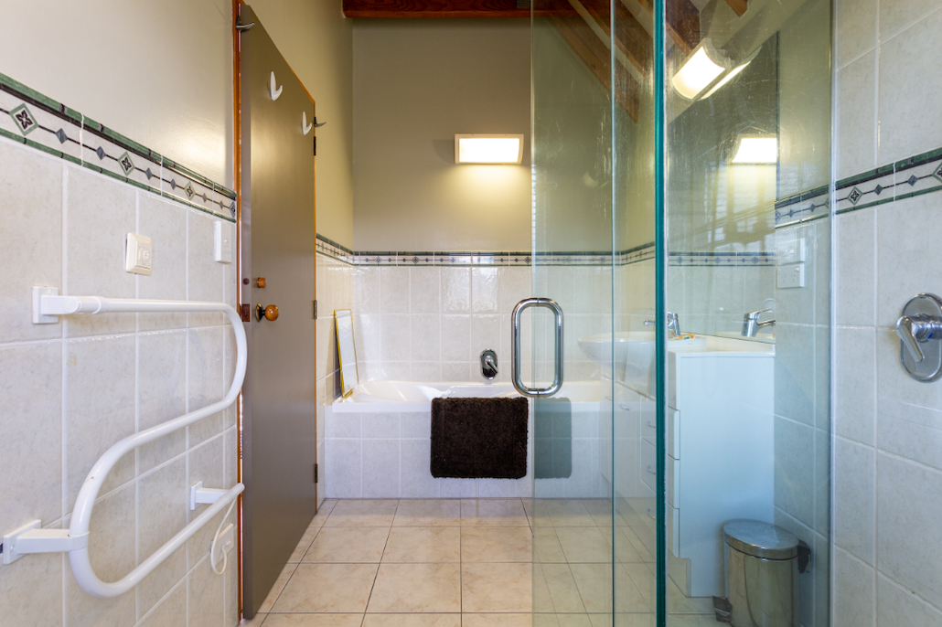 Large bathroom with glass shower